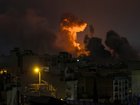 A large plume of smoke rises over Tehran after explosions were reported in the city during the night on March 28, 2026 in Tehran, Iran. 