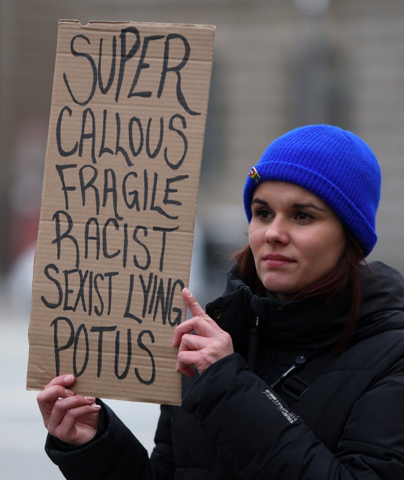 An activist attends a "No Kings" protest against the current U.S. federal government on March 28, 2026 in Berlin, Germany.
