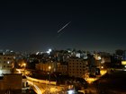 Missiles fired from Iran toward Israel are seen in the skies over Hebron, West Bank on March 24, 2026. 