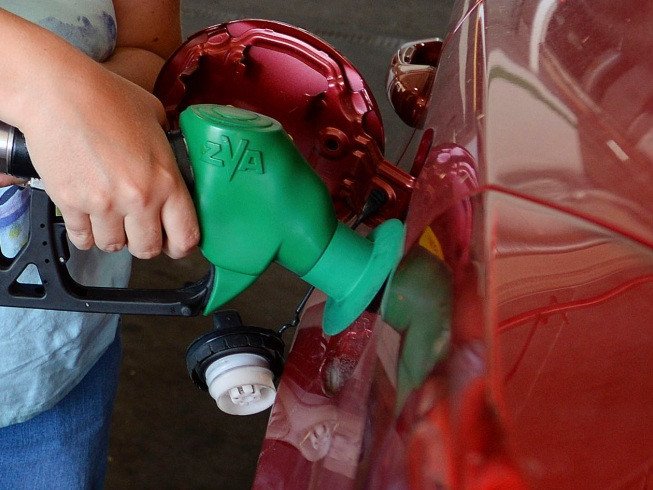 Markets dip as oil jumps.