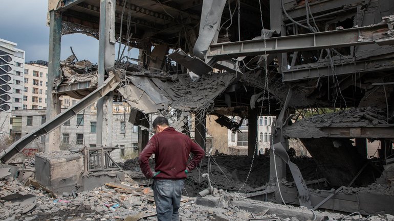 A building hit by a US-Israeli strike on a commercial district in Tehran. 