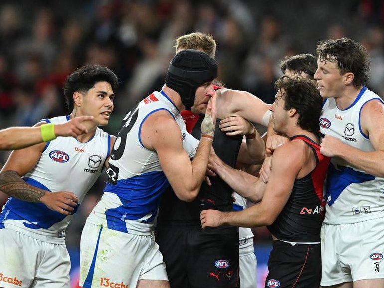 North Melbourne's Tristan Xerri (c) will front the AFL tribunal on Monday evening. (James Ross/AAP PHOTOS)