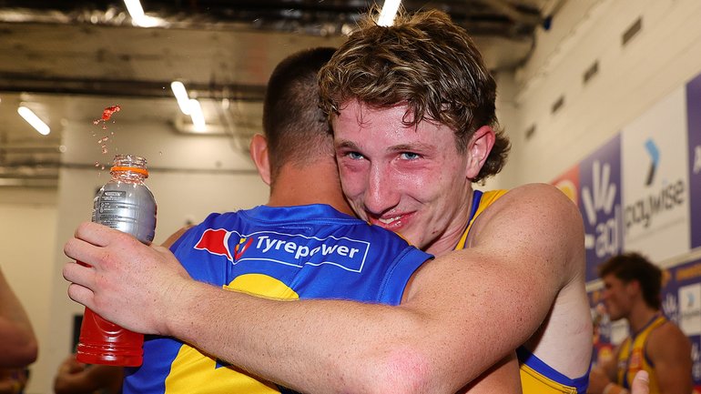 Willem Duursma embraces Elliot Yeo after West Coast’s win on Sunday.