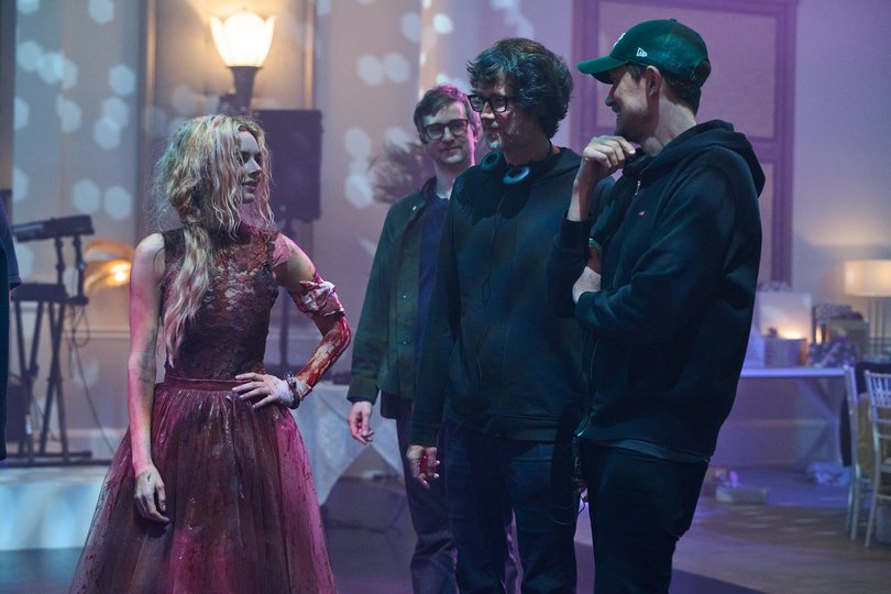 Samara Weaving with directors Tyler Gillett and Matt Bettinelli-Olpin on the set of Ready Or Not 2: Here I Come.
