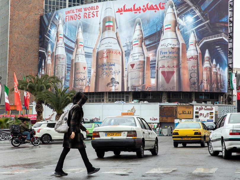 A billboard depicting Iranian missiles, and including references to Israel and Jeffrey Epstein in Tehran.