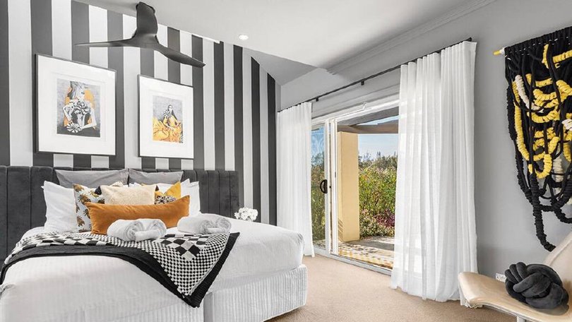 One of the four bedrooms inside the home Married at First Sight relationship expert John Aiken has listed for sale in Pokolbin.