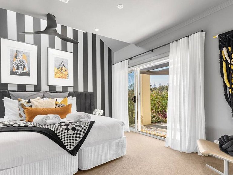 One of the four bedrooms inside the home Married at First Sight relationship expert John Aiken has listed for sale in Pokolbin.