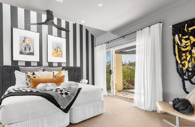 One of the four bedrooms.