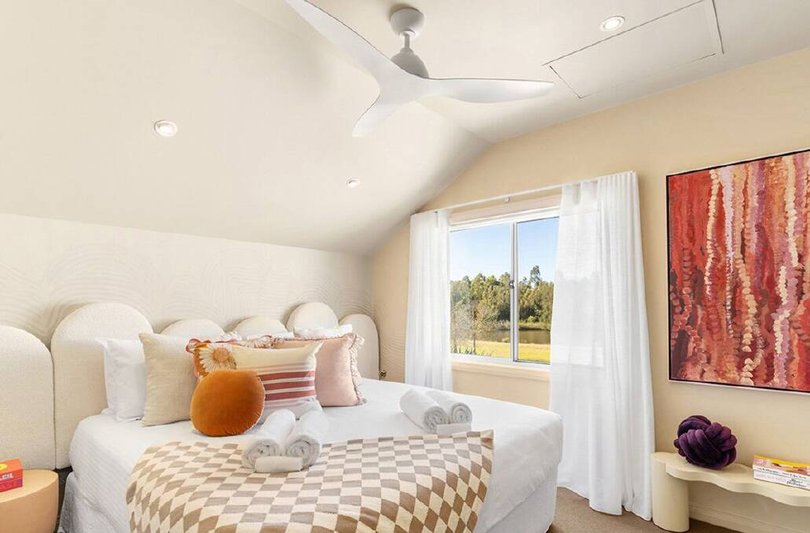 One of the four bedrooms.