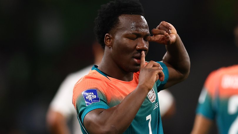 Nestory Irankunda of Australia celebrates scoring a goal.