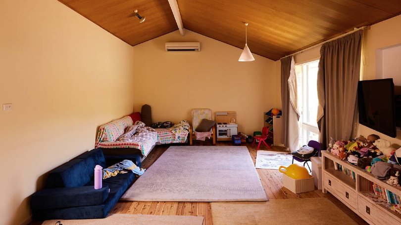 The before image of the living room. Pic: Three Birds Renovations.