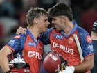 Cooper Connolly (left) and fellow Aussie Xavier Bartlett celebrate Punjab's victory over Gujarat.   (AP PHOTO)
