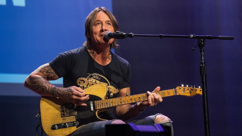 Keith Urban is reportedly 'in good spirits" and has been focusing his attention on his music. (AP PHOTO)