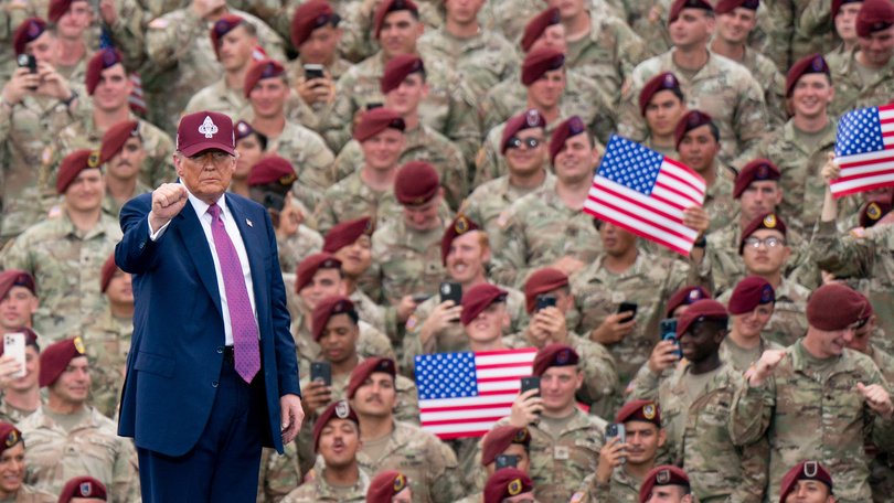 US President Donald Trump with US troops in Fort Bragg, North Carolina, last year.