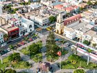 Flying with drone above La Punta del Callao in Lima, a small peninsula deep in the Pacific ocean with residential homes and beaches. 