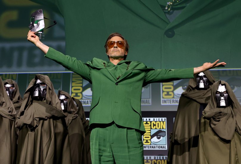 Robert Downey Jr. is unveiled onstage at the San Diego Comic Con to be returning to the MCU. 