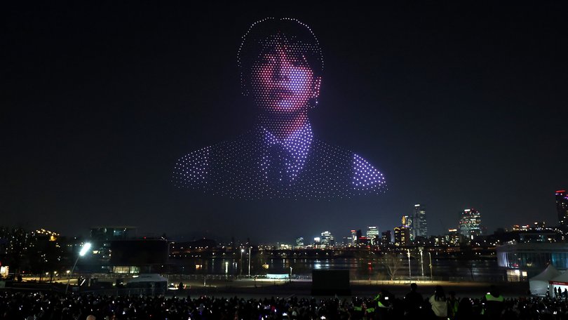 Drones form a pattern in the shape of K-pop boy band BTS's member Jung Kook ahead of their comeback concert.