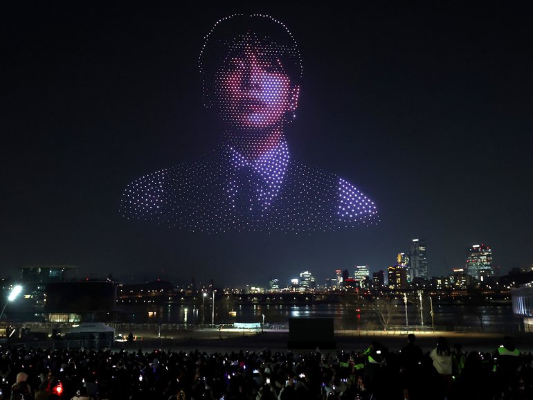Drones form a pattern in the shape of K-pop boy band BTS's member Jung Kook ahead of their comeback concert.