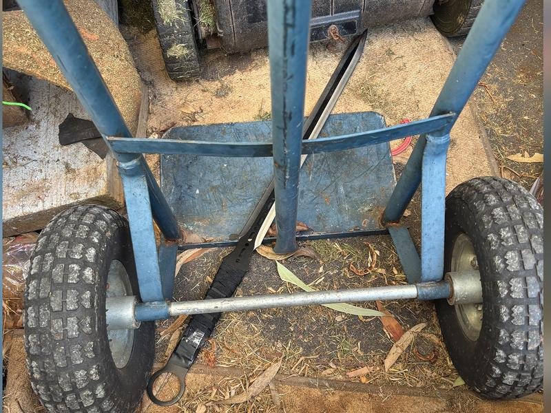A sword shown lying on a shed floor was seized by police days after two boys were stabbed to death. (PR IMAGE PHOTO)