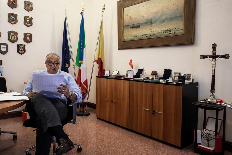 Mayor Roberto Lagalla goes over tourism statistics at the city hall in Palermo, Sicily, Italy.