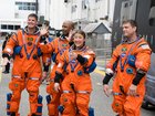 NASA astronauts Reid Wiseman, commander; Christina Koch, mission specialist; Victor Glover, pilot; and CSA (Canadian Space Agency) astronaut Jeremy Hansen, mission specialist wave to family and friends as they prepare to depart.