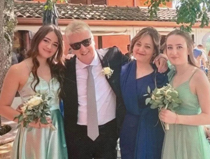 Gianni Di Vita and Antonella Di Ielsi with their daughters.