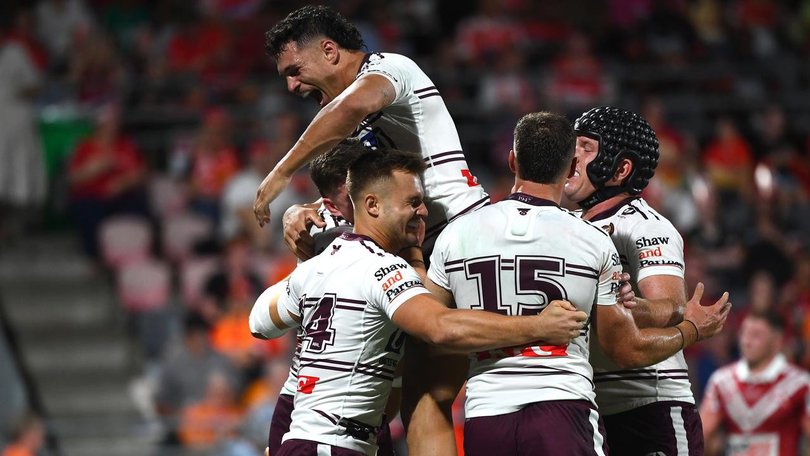 Manly were celebrating as they stunned the Dolphins 52-18 under new coach Kieran Foran. (Jono Searle/AAP PHOTOS)
