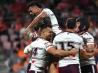 Manly were celebrating as they stunned the Dolphins 52-18 under new coach Kieran Foran. (Jono Searle/AAP PHOTOS)