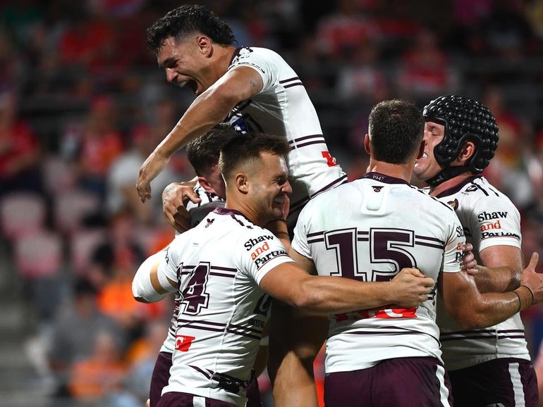 Manly were celebrating as they stunned the Dolphins 52-18 under new coach Kieran Foran. (Jono Searle/AAP PHOTOS)