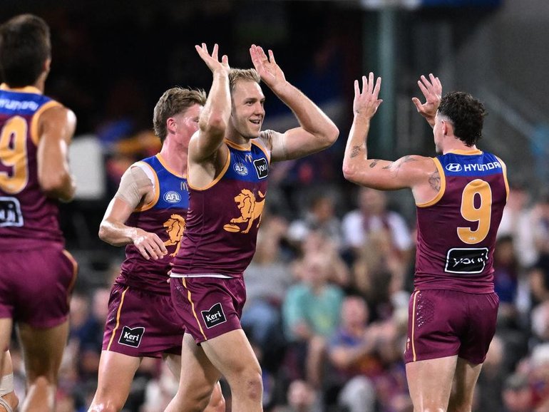 Offseason arrival Oscar Allen (c) made a strong impression for Brisbane as they beat Collingwood. (Darren England/AAP PHOTOS)