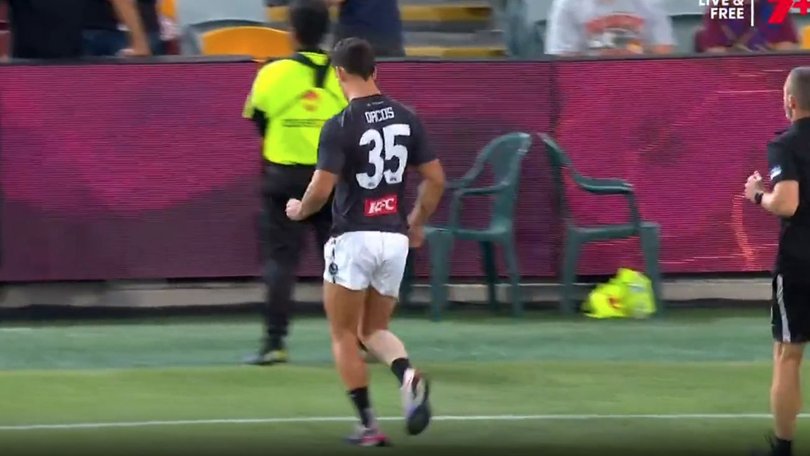 Nick Daicos tries to run before the game.