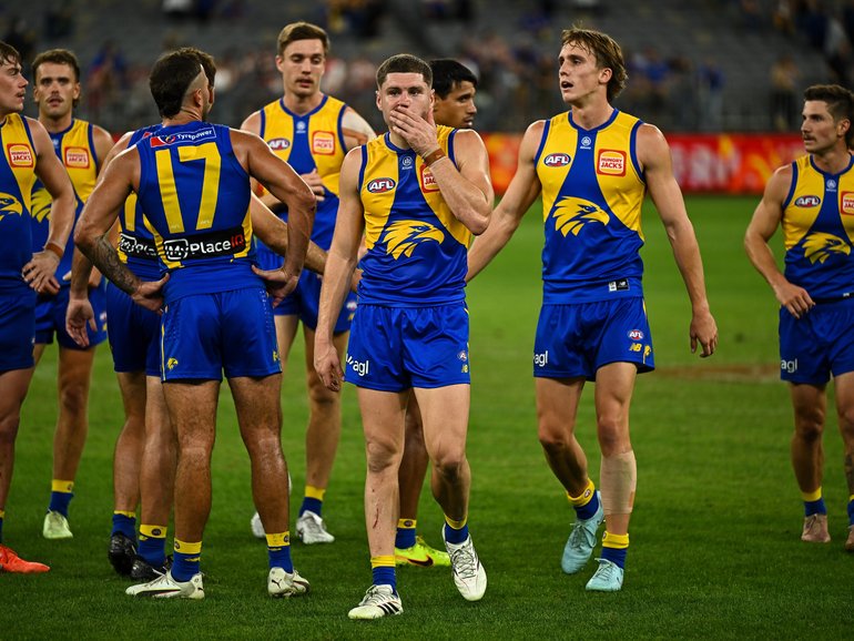 Harry Schoenberg of the Eagles looks dejected.