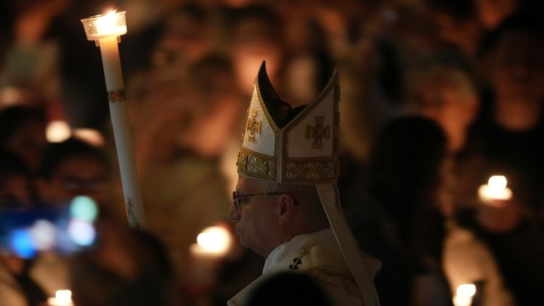 Pope Leo has led Catholics in an Easter vigil inside St Peter's Basilica at the Vatican. (AP PHOTO)