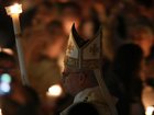 Pope Leo has led Catholics in an Easter vigil inside St Peter's Basilica at the Vatican. (AP PHOTO)