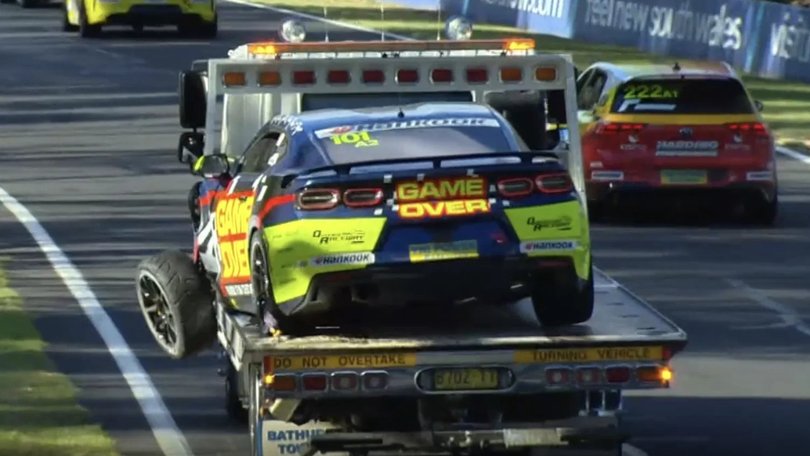 Grant Denyer’s Camaro being towed away.