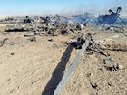 Wreckage is seen from what Iranian authorities say is a US military helicopter that crashed during a mission to rescue a missing F-15E pilot.