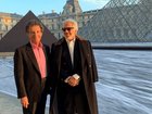 A photograph released by the U.S. Department of Justice  shows Jeffrey Epstein, right, with Jack Lang, a former French culture minister, outside the Louvre in Paris. Epstein spent his last days of freedom in Paris, meeting with influential figures. 