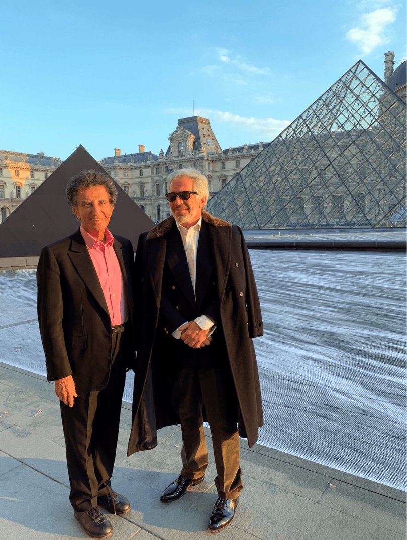 A photograph released by the U.S. Department of Justice shows Jeffrey Epstein, right, with Jack Lang, a former French culture minister, outside the Louvre in Paris. Epstein spent his last days of freedom in Paris, meeting with influential figures.
