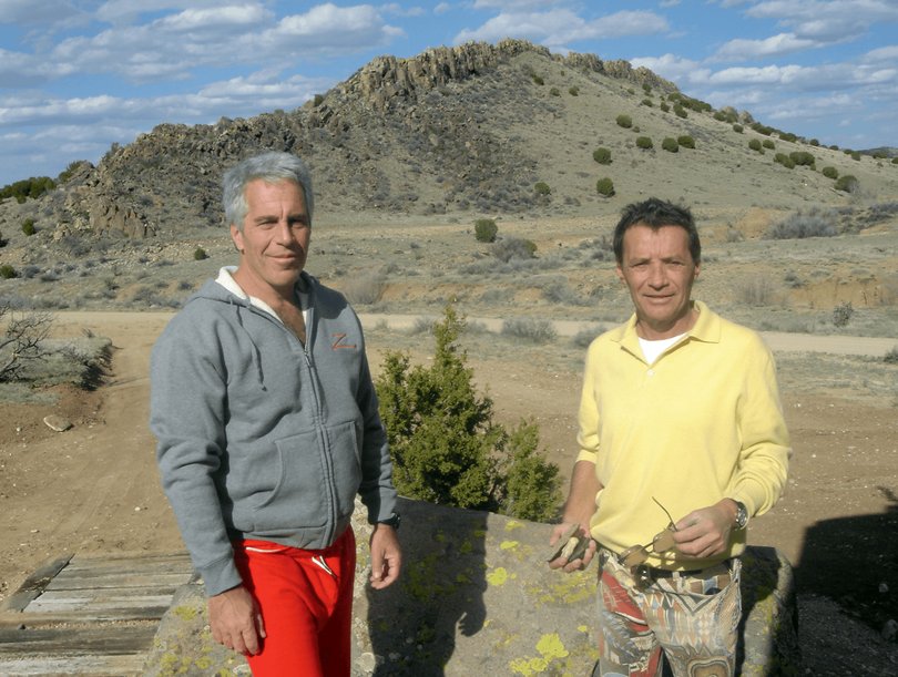 An undated photograph released by the U.S. Department of Justice shows Jeffrey Epstein, left, and Jean-Luc Brunel, a French model scout who prosecutors said trafficked minors to Epstein and was found dead in his prison cell in 2022, in an apparent suicide.