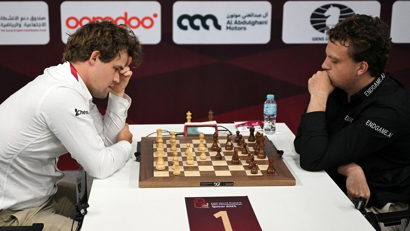 Magnus Carlsen plays against US' Niemann Hans Moke at the FIDE World Rapid and Blitz Championships 2025.