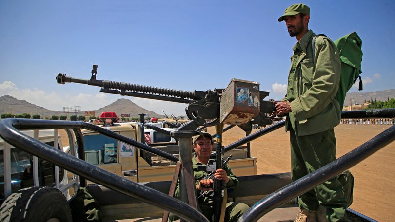 Yemeni soldiers keep vigil, as supporters of the Iran-backed Houthi movement, in solidarity with Iran and Lebanon on April 8.