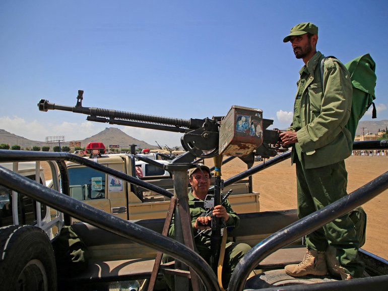 Yemeni soldiers keep vigil, as supporters of the Iran-backed Houthi movement, in solidarity with Iran and Lebanon on April 8.