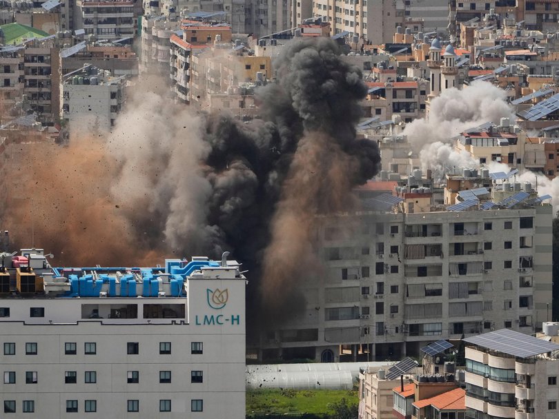 Smoke rises following several Israeli airstrikes in Beirut on April 8.