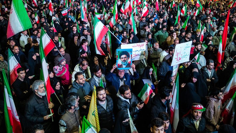 Pro-government supporters in Tehran after the ceasefire was announced.