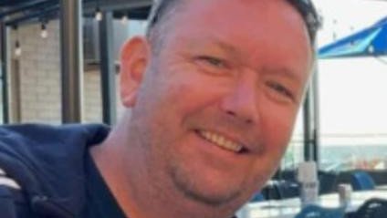 The body of Chris Robertson, 49, was found in a Lonsdale workshop in South Australia.