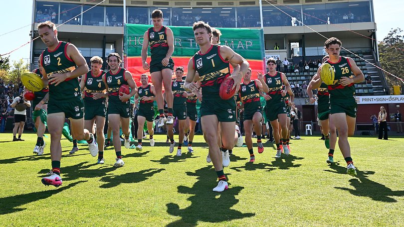 Devils take the field during the round one VFL match between Tasmania Devils and Coburg Lions.