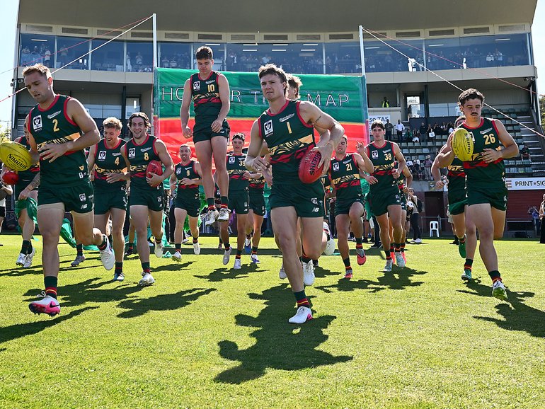 Devils take the field during the round one VFL match between Tasmania Devils and Coburg Lions.