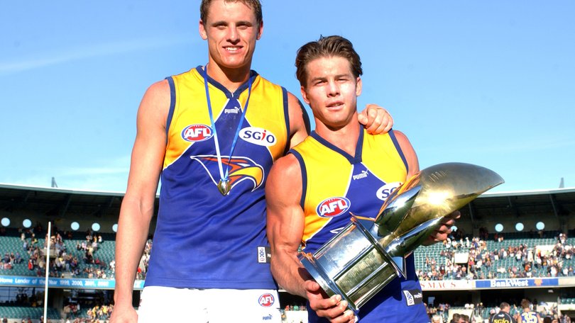 Michael Gardiner with the Ross Glendinning medal and captain Ben Cousins after the round five derby with the Fremantle Dockers at Subiaco Oval in 2003.