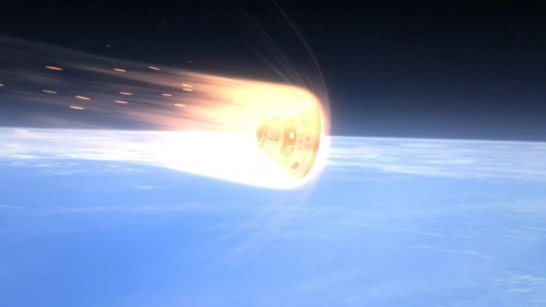 A NASA rendering shows the Orion spacecraft passing through Earth’s atmosphere. 