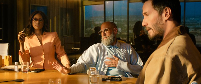 Jonah Hill on screen in Outcome, with Laverne Cox and Keanu Reeves.